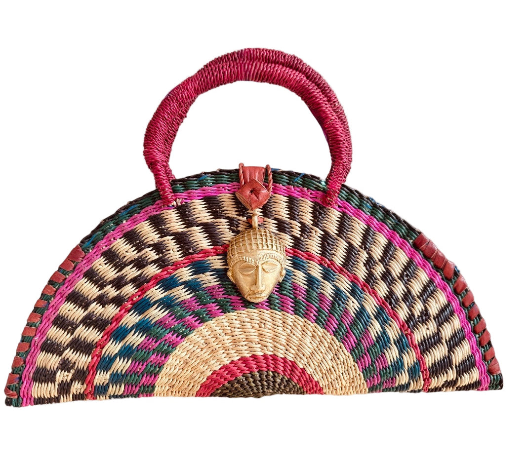 African Handwoven Half-Moon Bag with Brass Mask Pendant & Red Handles