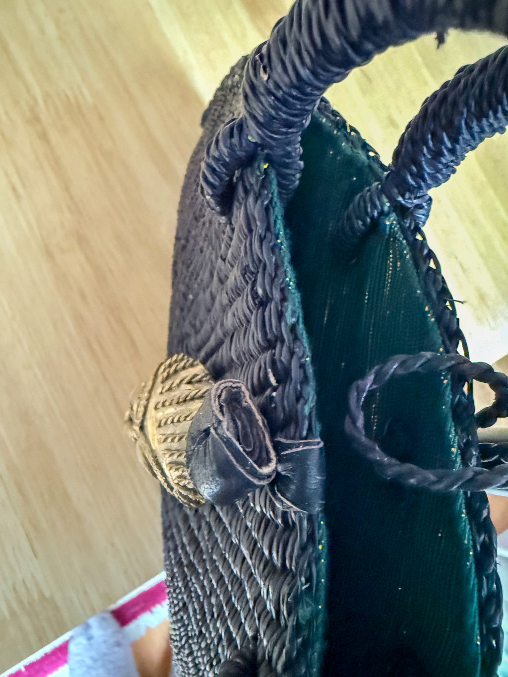 Handwoven Black Half-Moon Raffia Bag with Brass Mask – Artisan Made in Ghana